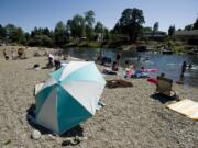 Swimmers flock to Sandy Swimming Hole on the Washougal River in 2010.