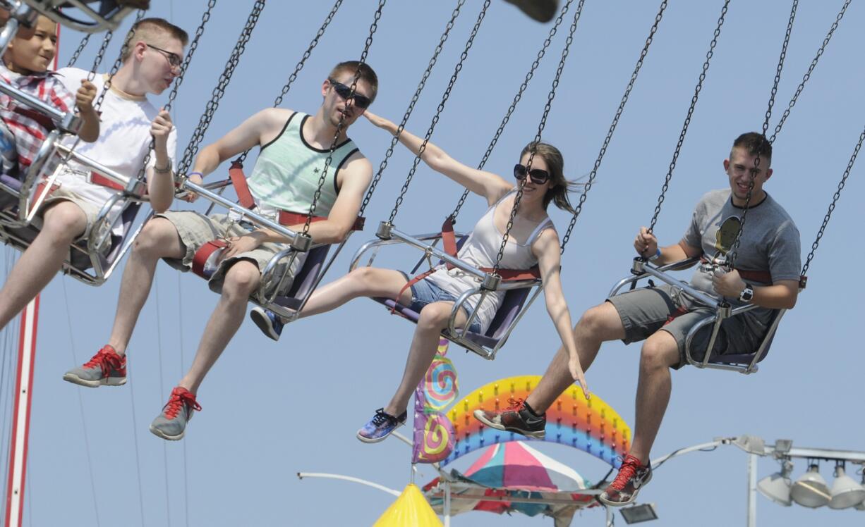 Riders enjoy the last day of the Clark County Fair on Sunday, despite the hot weather.