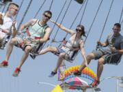 Riders enjoy the last day of the Clark County Fair on Sunday, despite the hot weather.