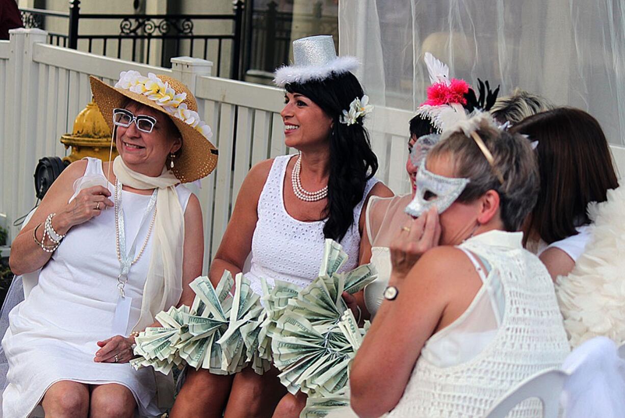 Dinner in White brings together people from Camas and Washougal, as well as other locales in Southwest Washington, who dress casually to fashionably all in white. This year's event is moving from downtown Camas to Marina Park along the Columbia River in Washougal.