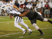 Associated Press files
Washington State junior nose tackle Robert Barber brings experience to the Cougars' defense.