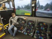 Student james West rides a bus to Yacolt Monday March 23, 2015. The No. 47 bus between Battle Ground and Yacolt, one of C-Tran's least-used routes.