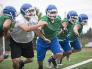 From left in blue shorts, Chris Mitchell, Isaiah Carbajal, and Ethan Tonder bring experience to the offensive line at Mountain View.