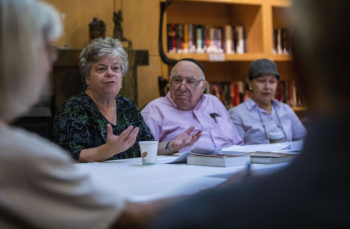 Doreen Alhadeff speaks to the Ladino class at The Summit at First Hill retirement community about Spanish citizenship in Seattle. Isaac Azose and his wife, Elisa, are listening at right. Alhadeff plans to become a Spanish citizen.