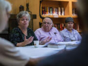 Doreen Alhadeff speaks to the Ladino class at The Summit at First Hill retirement community about Spanish citizenship in Seattle. Isaac Azose and his wife, Elisa, are listening at right. Alhadeff plans to become a Spanish citizen.