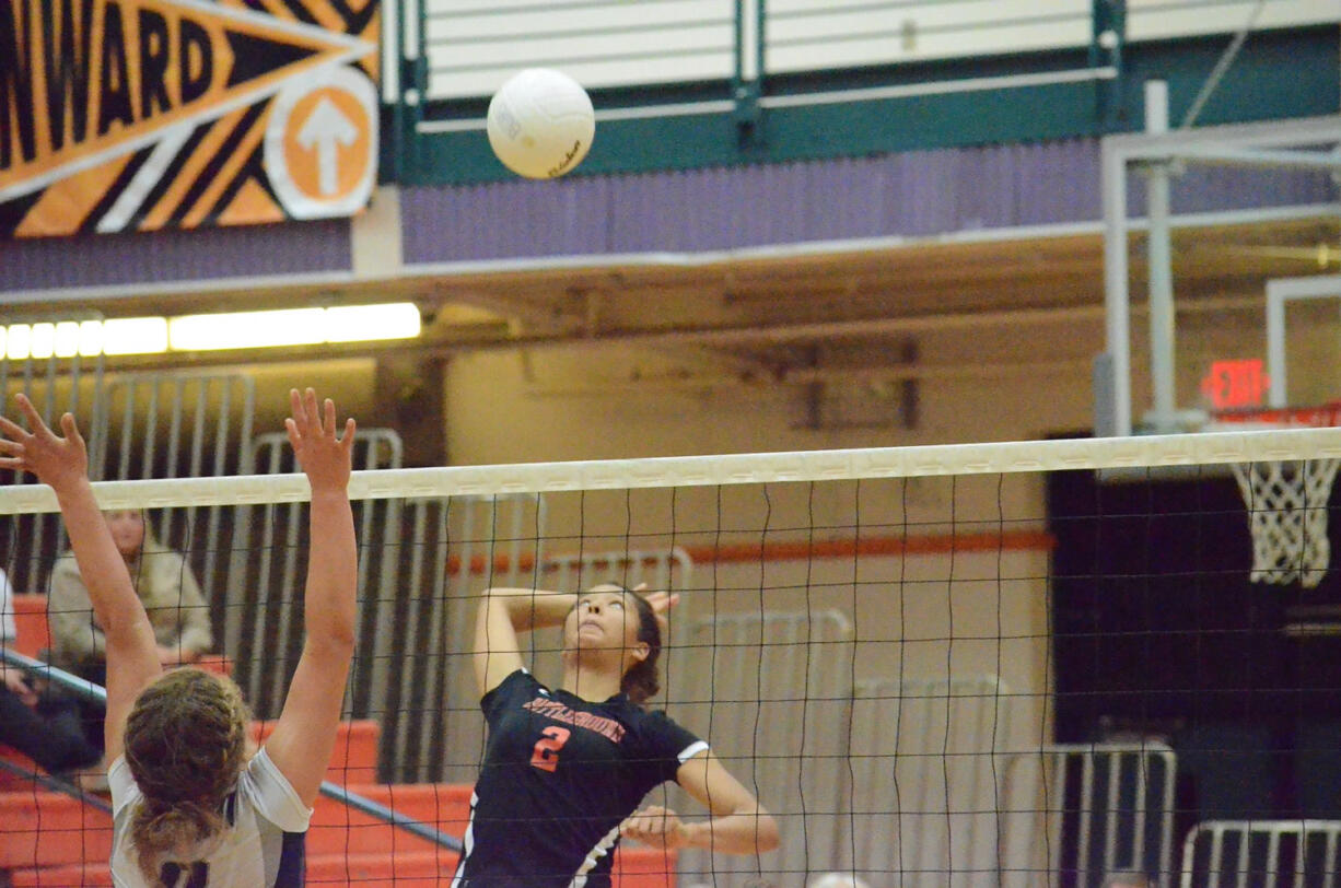 Battle Ground's Ashley Watkins (2) winds up for a spike in front of Skyview's Kaila Robinson in a Greater St. Helens League volleyball match Tuesday at Battle Ground High School.