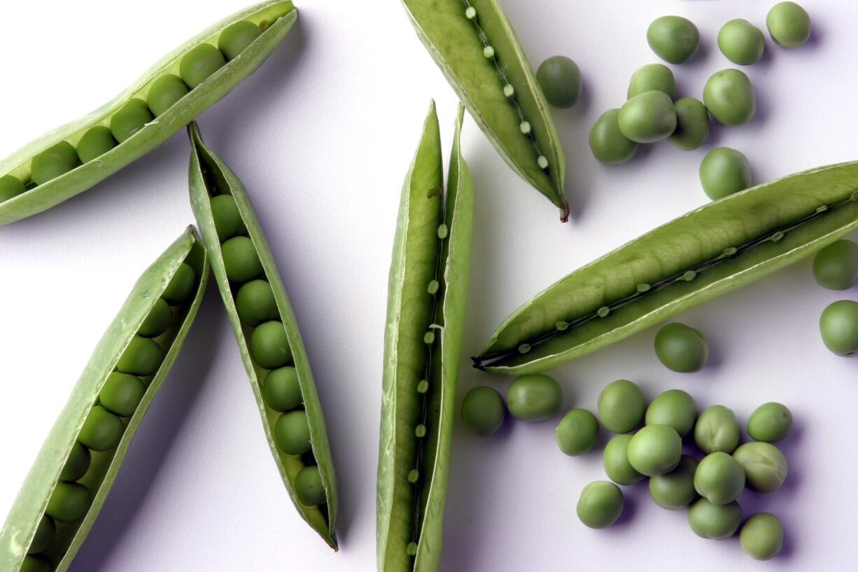 Two pounds of peas in the shell will yield about two cups of shelled peas.