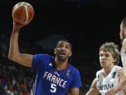 Nicolas Batum (5) said playing for France this summer, helping his team to the bronze medal at the basketball World Cup in Spain, can only make him a better leader for the Portland Trail Blazers this season.