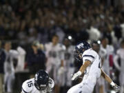 Zachary Kaufman/The Columbian
Skyview kicker Braden Hadfield and holder Brody Barnum successfully attempt an extra point in the first half against Camas at Doc Harris Stadium on Friday.