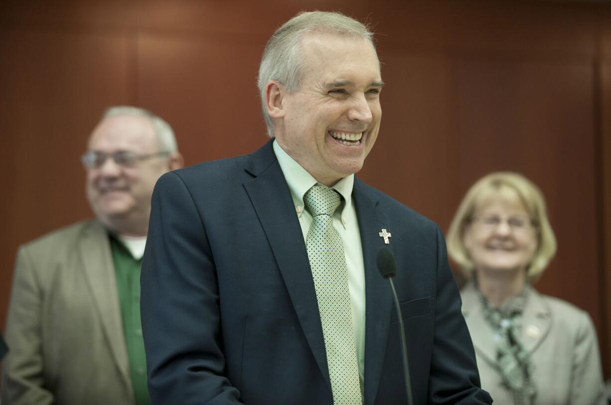 County councilors Tom Mielke, left, David Madore and Jeanne Stewart.