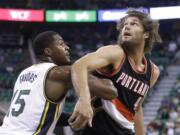 Portland's Robin Lopez takes up space in the paint, which allows him to set screens for shooters and get easy baskets from offensive rebounds.