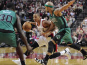 CJ McCollum, center, is showing better speed after injuring his foot early last season.