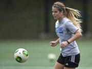 Clark College's Brenna Bogle practices with the team at Luke Jensen Sports Park on Tuesday November 4, 2014.