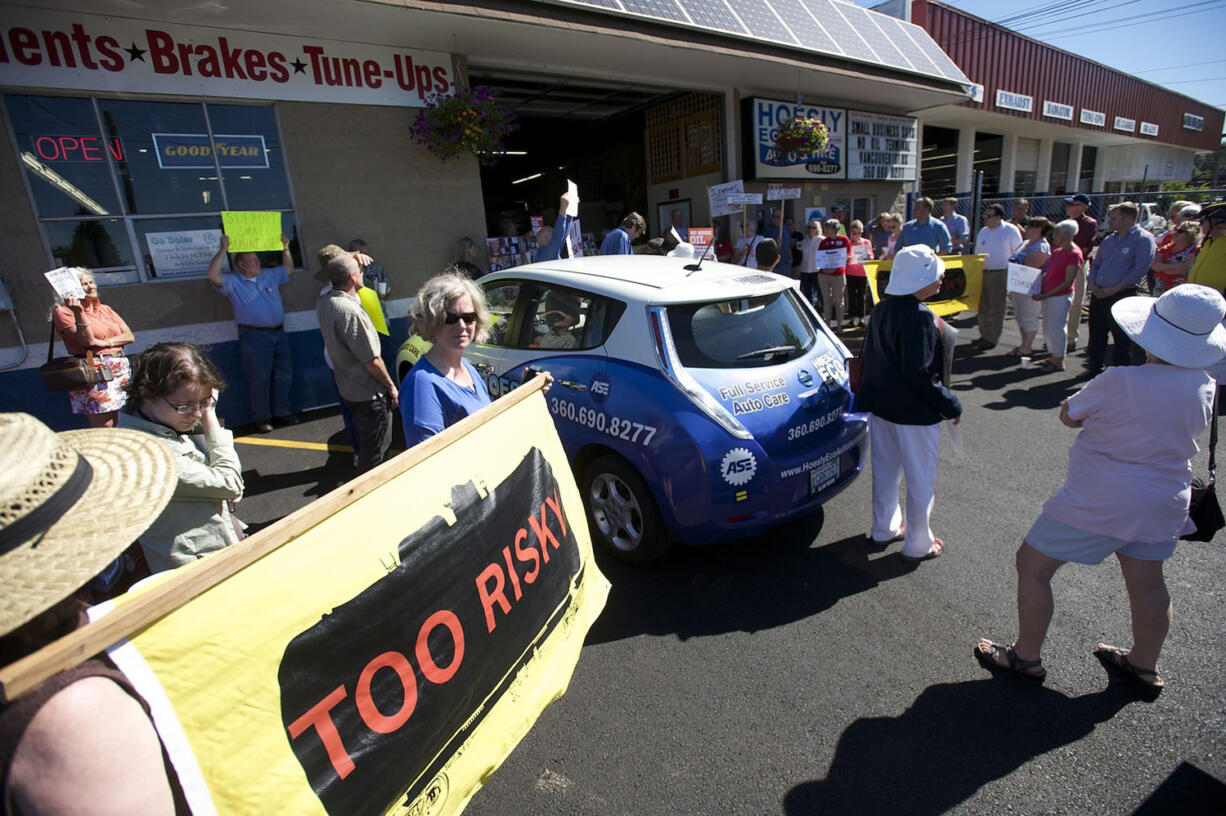 Small-business owners gathered Thursday in a show of opposition to a proposal to build what would be the nation's largest rail-to-marine oil transfer terminal at the Port of Vancouver.