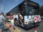 A C-Tran bus drops off passengers at the Clark County Fair in Ridgefield on Wednesday.