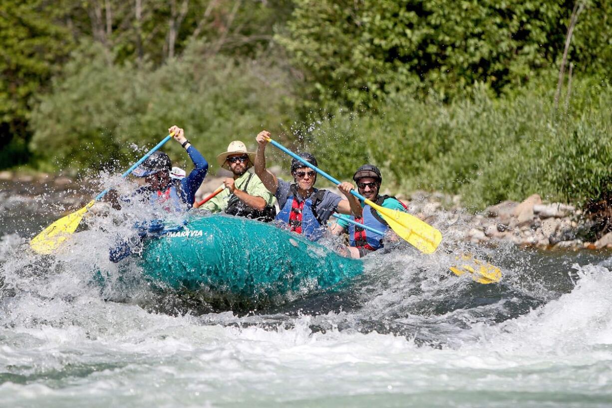 Rafters on the Middle Fork of the Salmon River run through Pungo Canyon, Idaho.