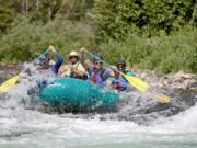 Rafters on the Middle Fork of the Salmon River run through Pungo Canyon, Idaho.