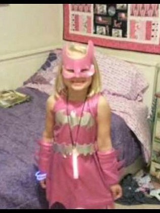 Cadence Boyer, 7, wears the Batgirl costume she was wearing on Halloween night when she was struck by a car while trick-or-treating.