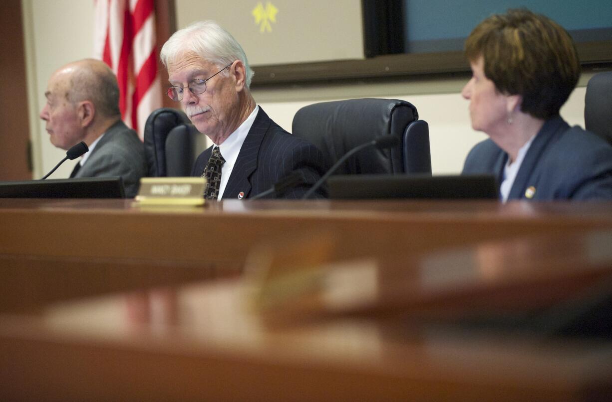 The Port of Vancouver commissioners, from left, Jerry Oliver, Brian Wolfe and Nancy Baker meet on Oct.