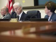 The Port of Vancouver commissioners, from left, Jerry Oliver, Brian Wolfe and Nancy Baker meet on Oct.