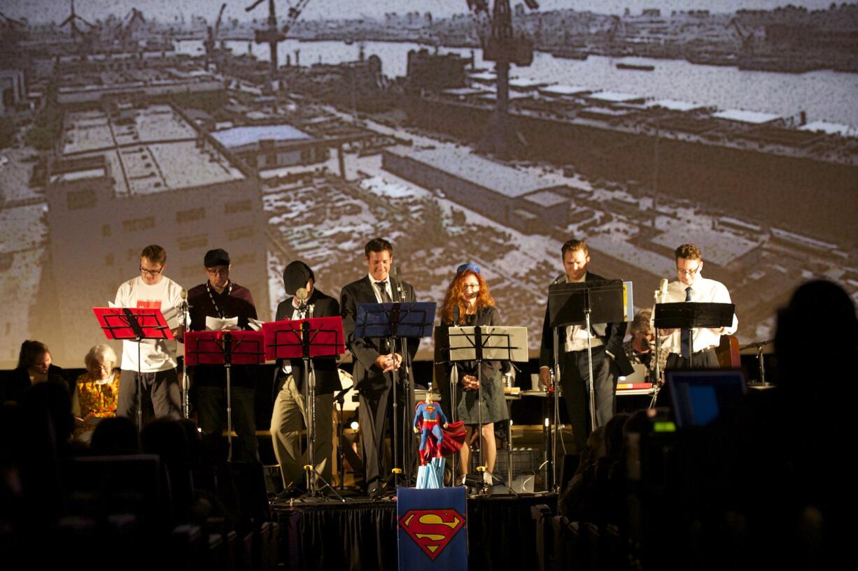 Mayor Tim Leavitt, center, Jim Mains and others star in a &quot;Golden Age of Radio&quot; presentation, featuring Leavitt as Superman and Lou Brancaccio as newspaper editor Perry White in a free event Thursday at the Kiggins Theatre in Vancouver.