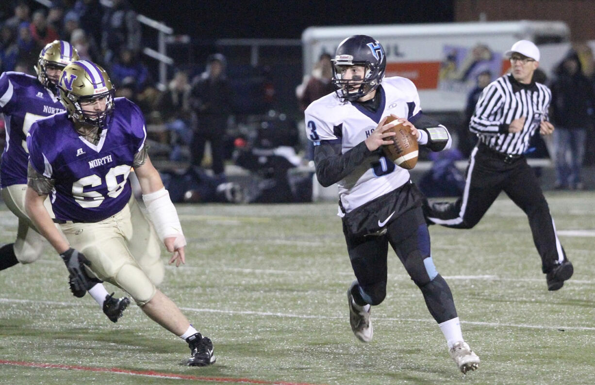 Hockinson quarterback Mitch Lines looks for a receiver against North Kitsap (Kitsap Sun photo)