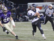 Hockinson quarterback Mitch Lines looks for a receiver against North Kitsap (Kitsap Sun photo)