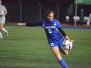 Ridgefield's Kara Klaus kicks the ball in a 2A state soccer semifinal match against Shorecrest on Friday in Shoreline.