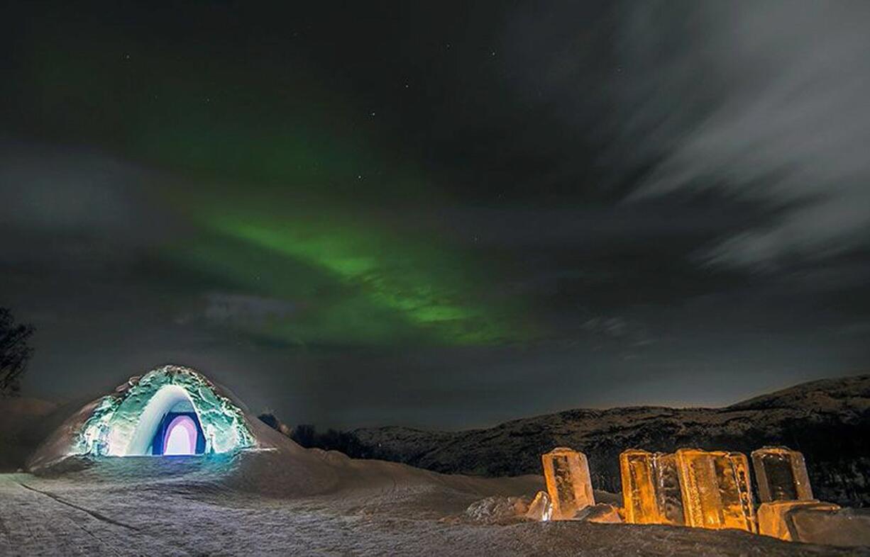 The Northern Lights above the Kirkenes Snow Hotel.