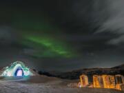 The Northern Lights above the Kirkenes Snow Hotel.