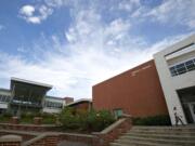 Students make their way across campus Monday at Clark College in Vancouver.