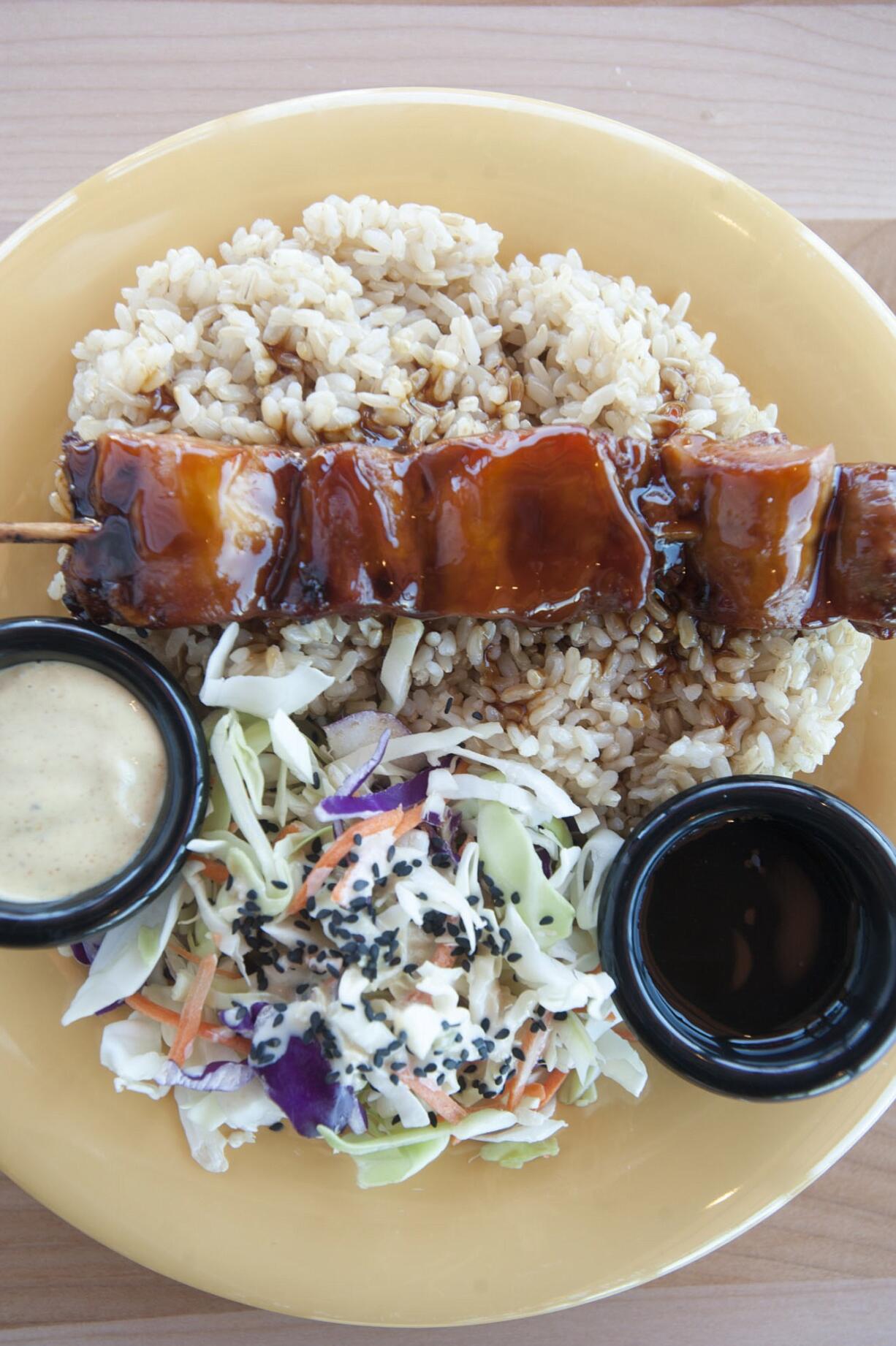 Chicken Yumm Bento with Original Yumm sauce is served at Caf?