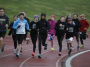 Evergreen Storm runners practice for the Junior Olympic national cross country championships in Myrtle Beach, SC.