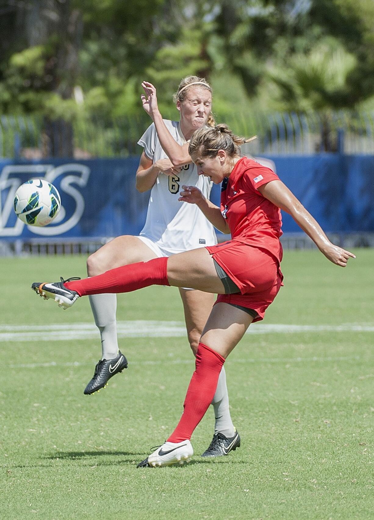 Arizona defender Sheaffer Skadsen, right.