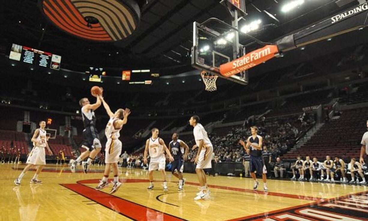 The Skyview boys basketball team take on Prairie in front of a few hundred fans at the Rose Garden in Portland on Monday.