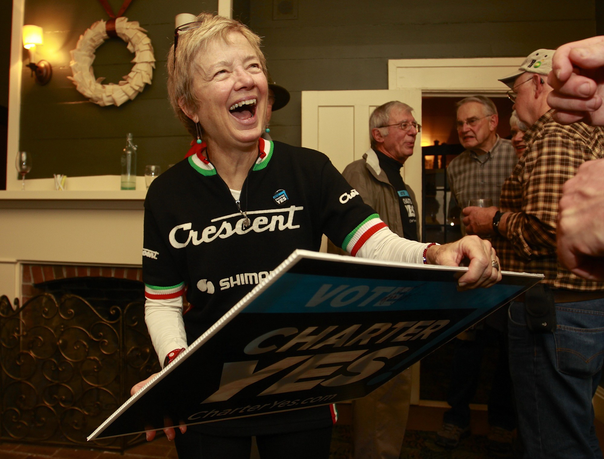 Steve Dipaola/For The Columbian
Pro-charter supporter Jan Verrinder reacts to the news the charter appears to have passed.