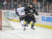 Austin Coldwell, right, played 19 games this spring with the Quad City Mallards of the East Coast Hockey League.