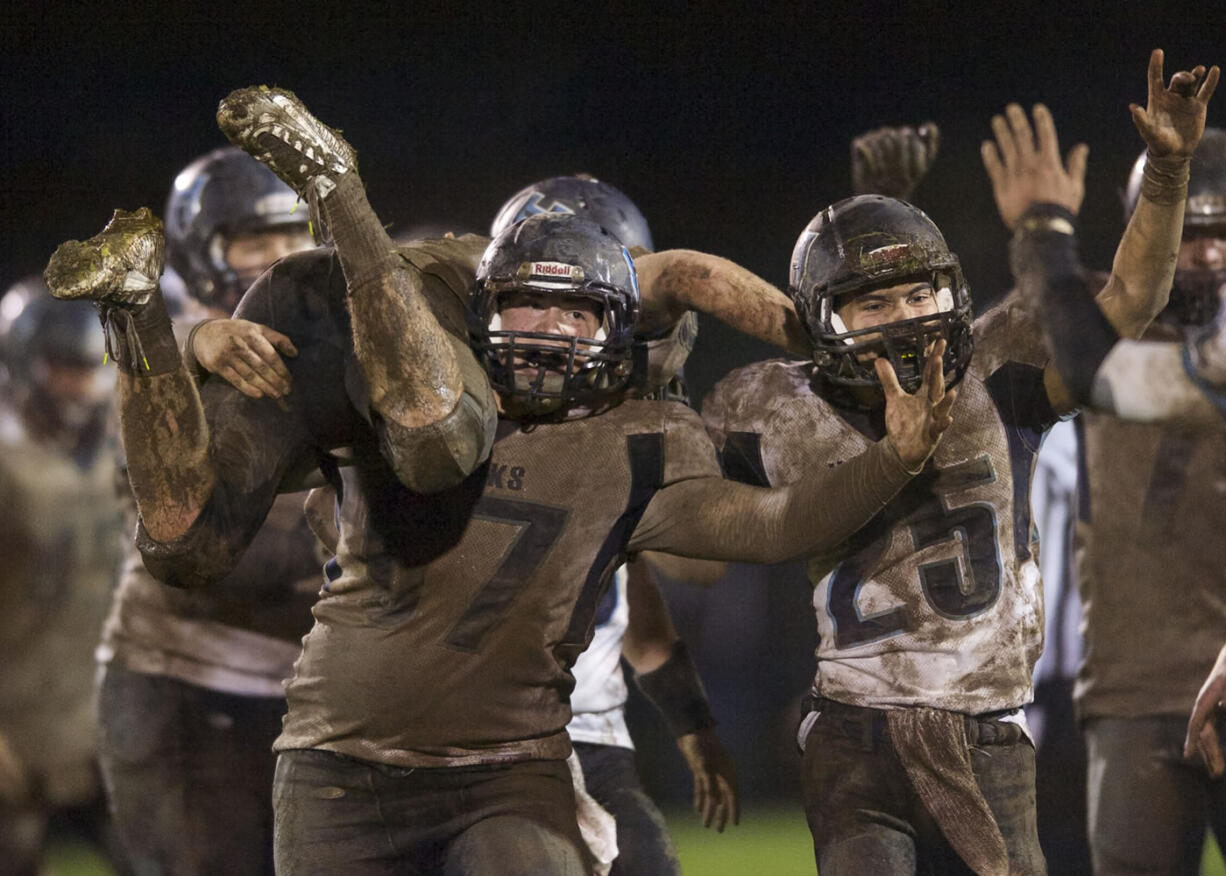 &quot;Muddy Celebration&quot; by Columbian photographer Steven Lane placed third in the Sports Photography category.