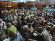 Hundreds of people packed into the sanctuary and nearby overflow rooms Sunday at First United Methodist Church to celebrate the life of philanthropist Ed Lynch.