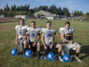 La Center's Dalton Morgan, from left, Michael Shufeldt, Zach Galster and Cole Judd are pictured at their team's practice field after practice Thursday evening, August 27, 2015.