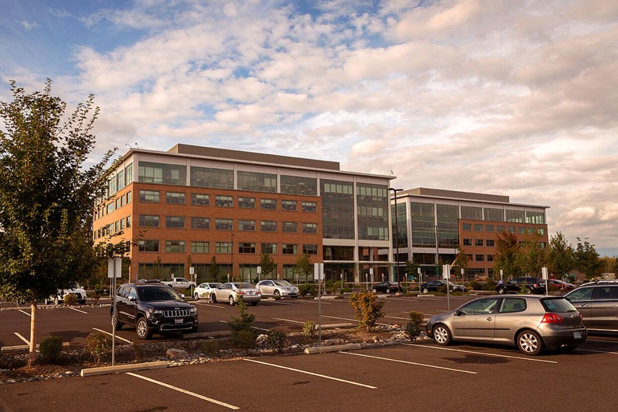 Fisher Investments is nearing completion of a second five-story office building at its Camas campus. The company's first office building opened in 2011, and it now has 880 local employees.