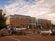 Fisher Investments is nearing completion of a second five-story office building at its Camas campus. The company's first office building opened in 2011, and it now has 880 local employees.