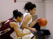 Steve Dipaola/For the Columbian
Clark College women's basketball guard Deborah Simmers (right).  ()