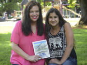 Ariane Kunze/The Columbian
Michelle Tuell, left, recently published a book about adopting her daughter, Maya Tuell, 12, from Nepal. The two are collecting donations for Maya's former orphanage in the wake of the recent earthquakes in Nepal.