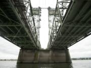 The current Interstate 5 Bridge, seen here looking toward the Oregon shore from under the lift span, is actually two bridges.