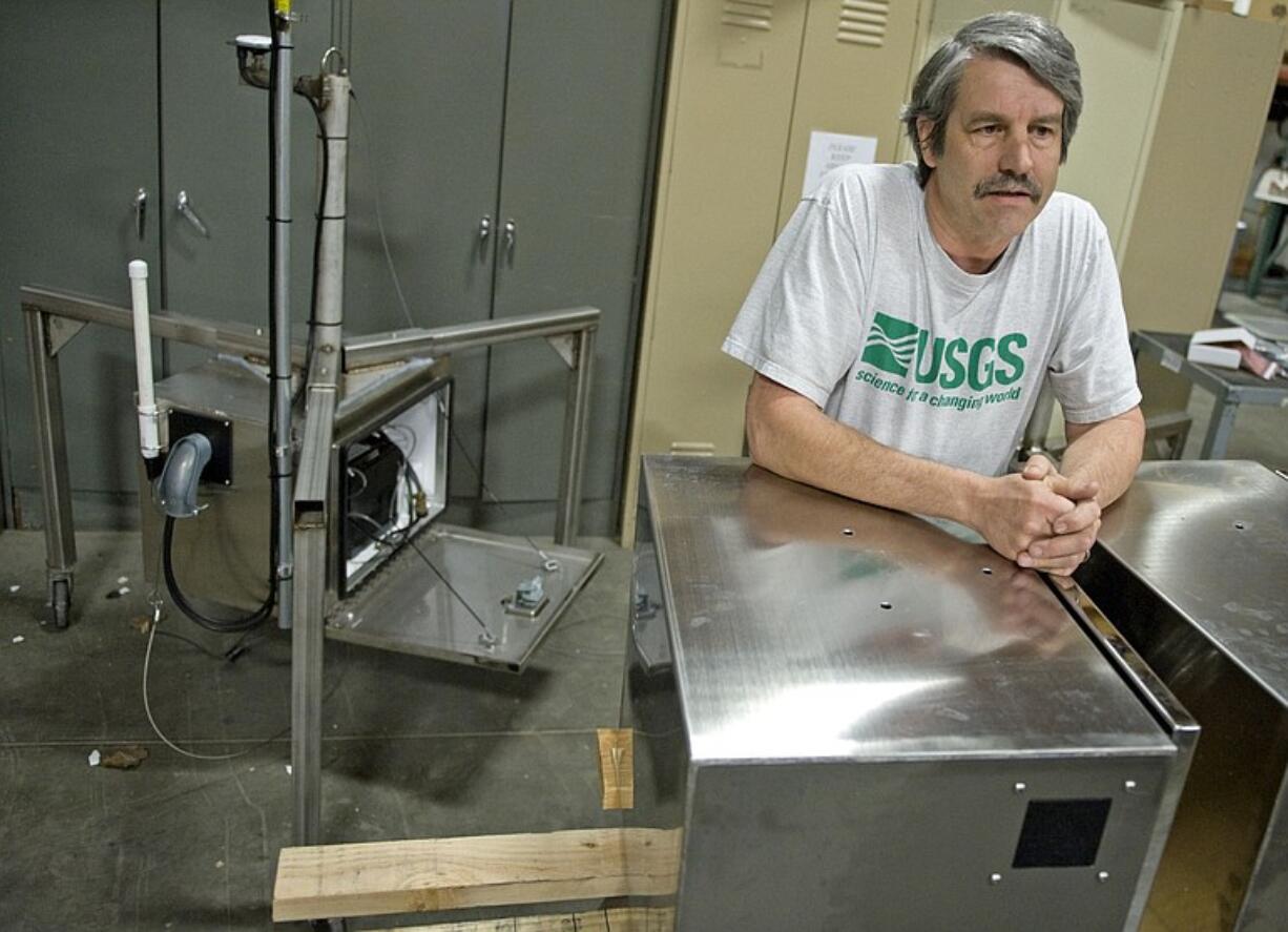 USGS Instrumentation Engineer Rick LaHusen talks about &quot;spider boxes&quot; which house sensitive equipment that monitors volcanic activity at the Cascade Volcano Observatory is in Cascade Park.