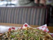 One of the specialties at Andrew's Pizza in Stevenson is the Thai Peanut Pizza.