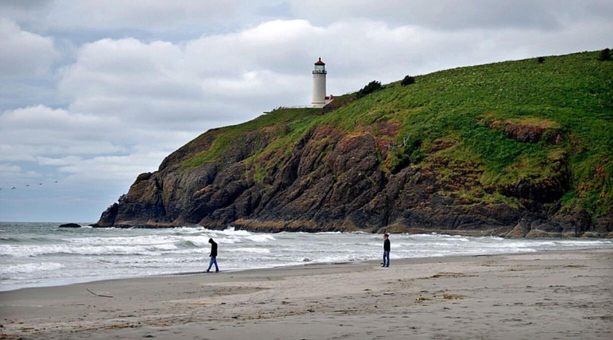 Cape Disappointment, at the mouth of the Columbia River, juts into the Pacific Ocean in this 2008 photo. New research indicates vast quantities of lava pushed out through the Columbia River basin much faster than previously understood.