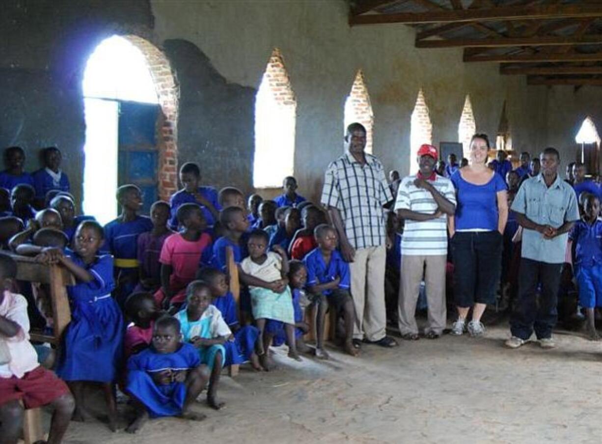 West Hazel Dell: Michelle Slavin with UNITE teachers and students from Busabura Primary School on Earth Day.