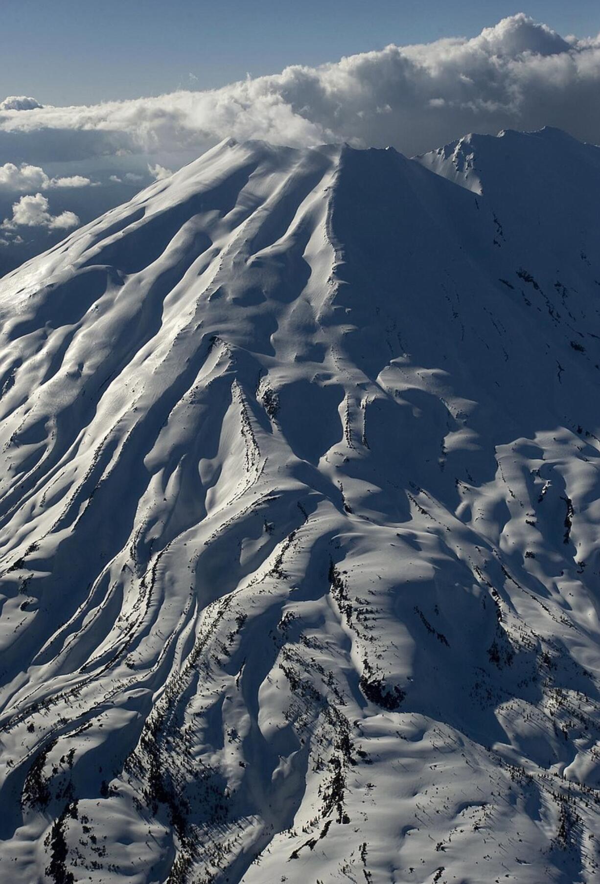 Thirty years after an eruption that obliterated its top 1,314 feet, debate swirls over management of the landscape surrounding Mount St.